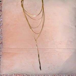 Gold multilayered necklace